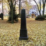 black tombstone and playground