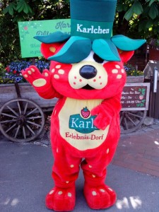 Karlchen, the friendly “strawbeary“ at the entrance/exit of Karl's