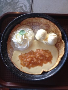 Karls Appelpankoken with apple compote, vanilla ice cream, custard, and whipped cream